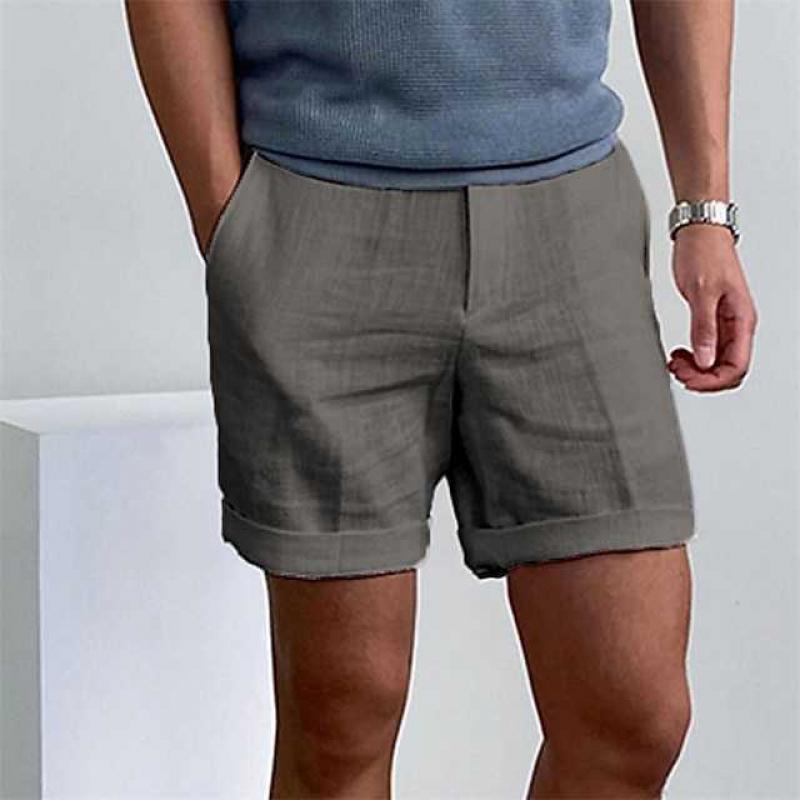 "Pantaloncini estivi da uomo in lino natural fango con orlo sfrangiato, stile casual chic, adatti per giornate calde."