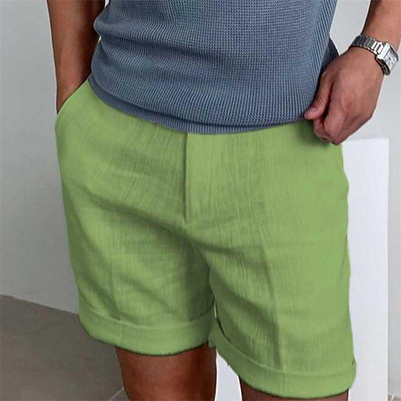 "Pantaloncini estivi da uomo in lino natural fango con orlo sfrangiato, stile casual chic, adatti per giornate calde."