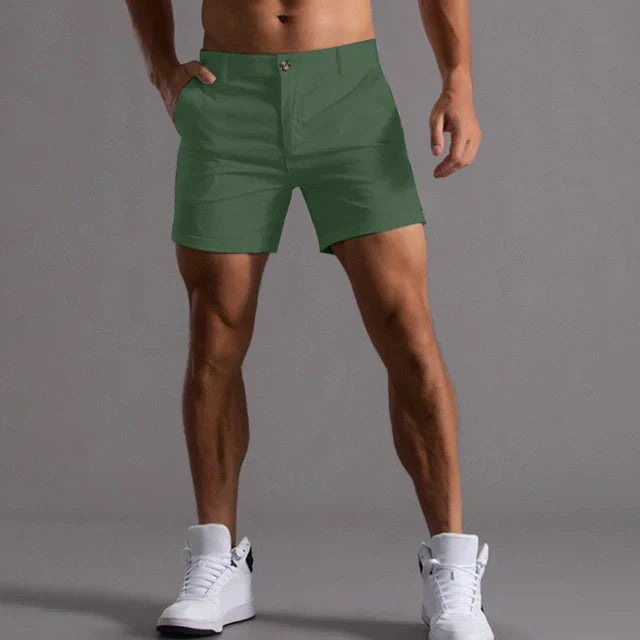 "Pantaloncini estivi uomo comodi, leggeri, in tessuto traspirante, taglio versatile, colore grigio, su sfondo bianco"