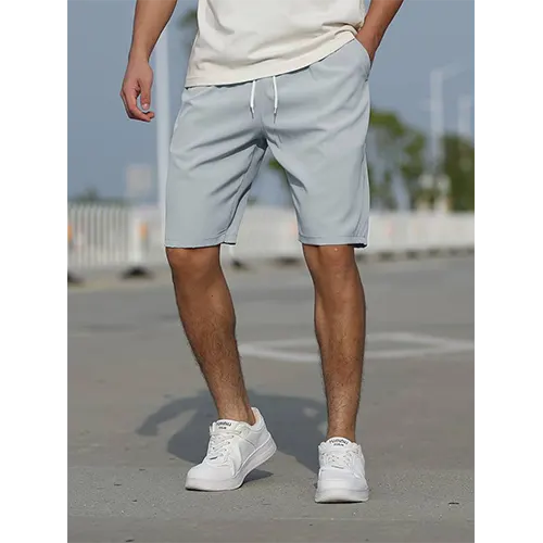 "Pantaloncini uomo vita alta blu navy traspiranti, adatti per l'estate, con design aderente e stile moderno."