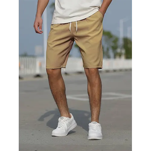 "Pantaloncini uomo vita alta blu navy traspiranti, adatti per l'estate, con design aderente e stile moderno."
