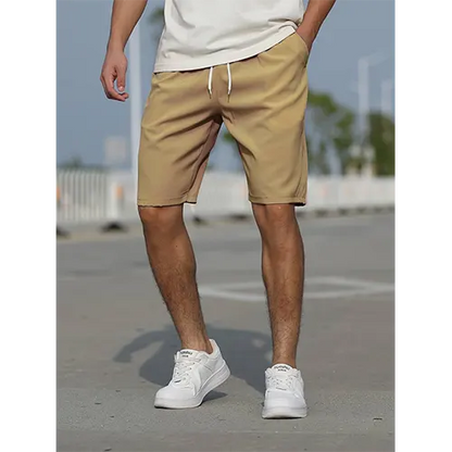 "Pantaloncini uomo vita alta blu navy traspiranti, adatti per l'estate, con design aderente e stile moderno."