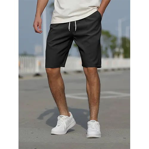 "Pantaloncini uomo vita alta blu navy traspiranti, adatti per l'estate, con design aderente e stile moderno."
