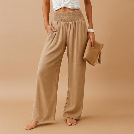"Pantaloni donna in lino estivi, eleganti e comodi, taglio dritto, vita elastica, colore chiaro, ideali per giornate soleggia
