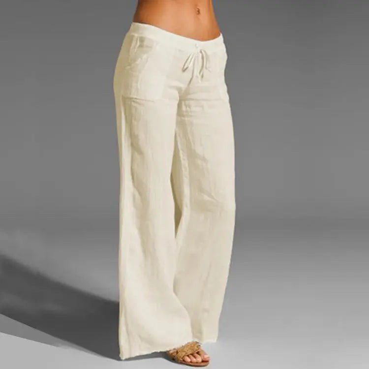 "Pantaloni estivi da donna in lino leggeri, vestibilità rilassata, colore naturale, ideali per look eleganti e freschi."