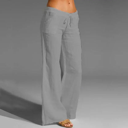 "Pantaloni estivi da donna in lino leggeri, vestibilità rilassata, colore naturale, ideali per look eleganti e freschi."