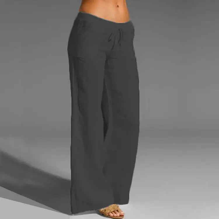 "Pantaloni estivi da donna in lino leggeri, vestibilità rilassata, colore naturale, ideali per look eleganti e freschi."