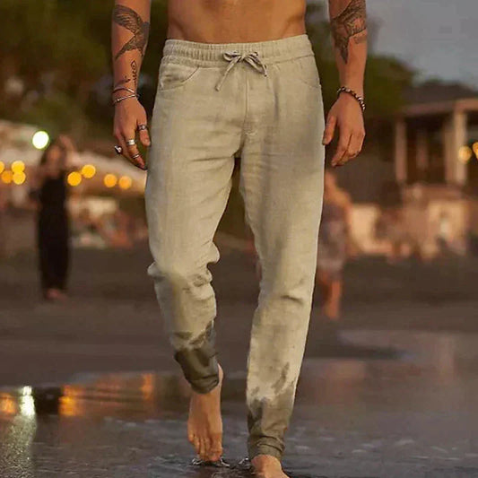 "Pantaloni leggeri in lino da uomo, beige chiaro, eleganti e comodi, ideali per l'estate, con vestibilità rilassata."
