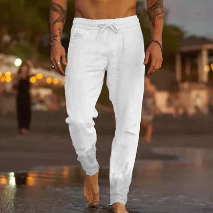 "Pantaloni leggeri in lino da uomo, beige chiaro, eleganti e comodi, ideali per l'estate, con vestibilità rilassata."