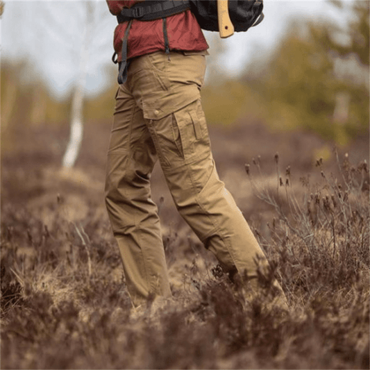 "Pantaloni tattici impermeabili da uomo, tessuto resistente, stile robusto, con tasche multiple e elastico in vita per comfor