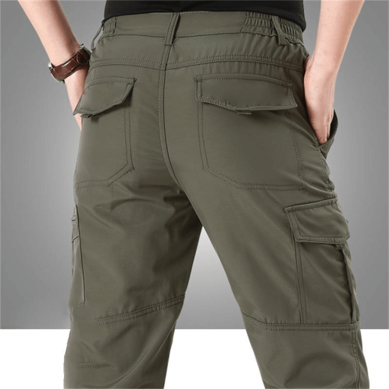 "Pantaloni tattici impermeabili da uomo, tessuto resistente, stile robusto, con tasche multiple e elastico in vita per comfor