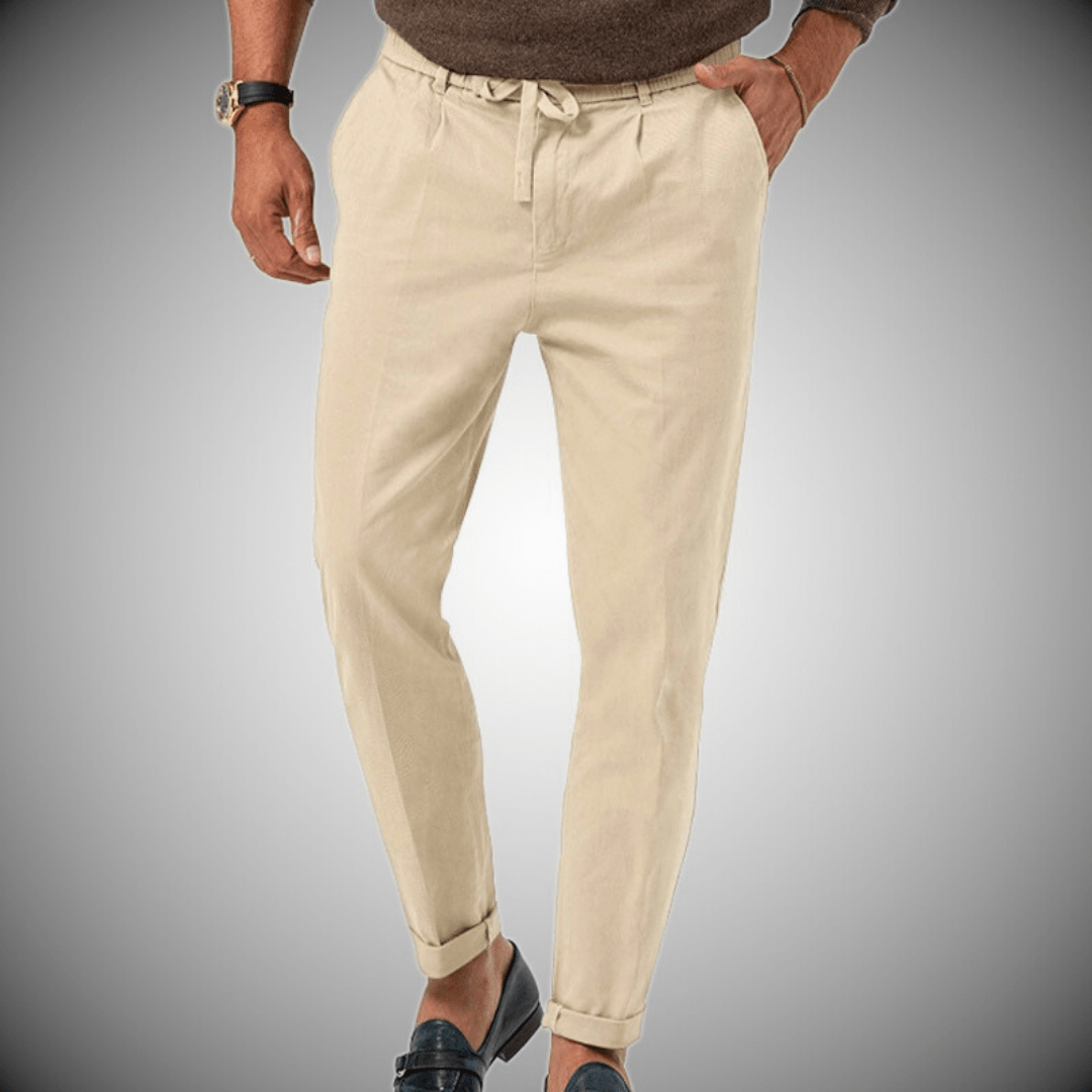 "Pantaloni uomo in lino, eleganti e traspiranti, colore beige, stile rilassato, ideali per look casual o formale."