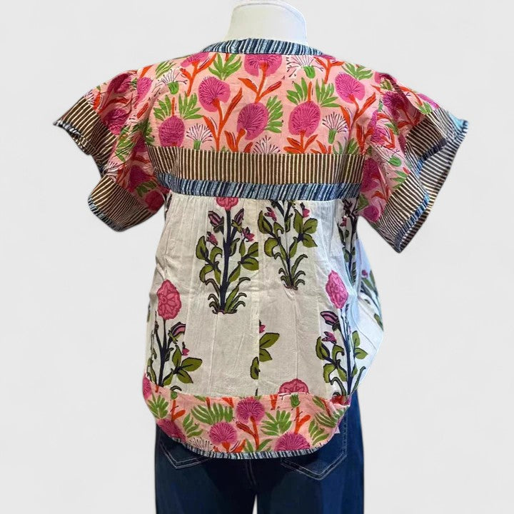 Elegant women's pink embroidered blouse. Comfortable, versatile relaxed fit top for casual everyday wear.
