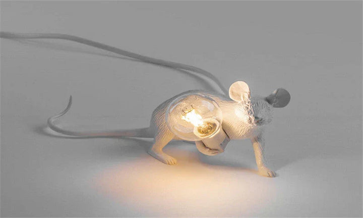 Unique decorative lighting: a playful mouse LED table lamp for modern whimsical homes.