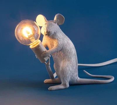Playful LED mouse lamp, a modern decorative light perfect for kids' rooms or unique table accents.