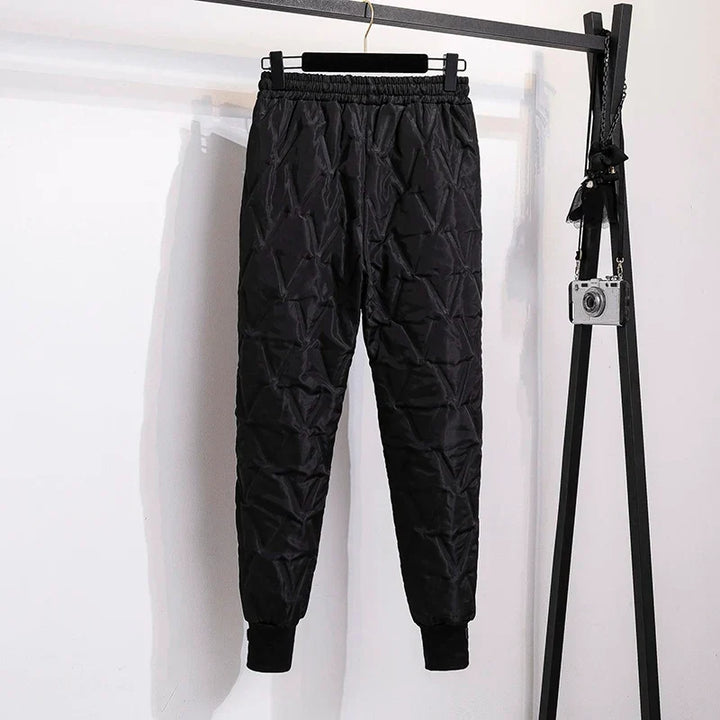 Back view of women's thermal comfort pants, plus size design with flattering fit for winter.