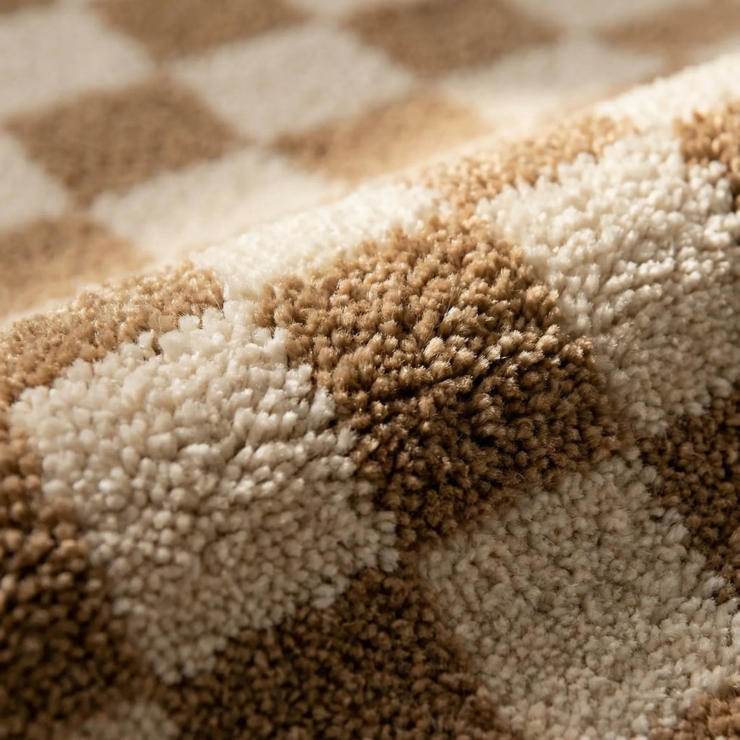Safe non-slip checkered bath mat, plush and absorbent for wet bathroom floors.