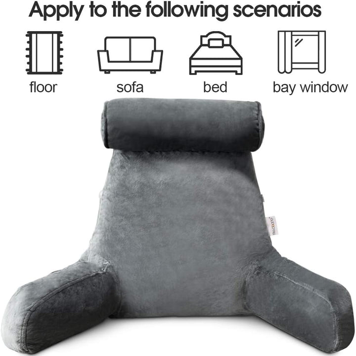 Supportive bed arm pillow in plush fabric, ideal for relaxation & reading.