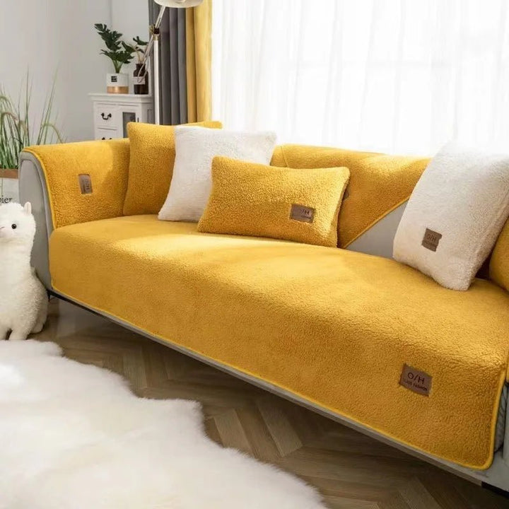 Non-slip plush sofa cover. Easy-to-clean, pet-friendly couch protector for ultimate comfort & living room protection.