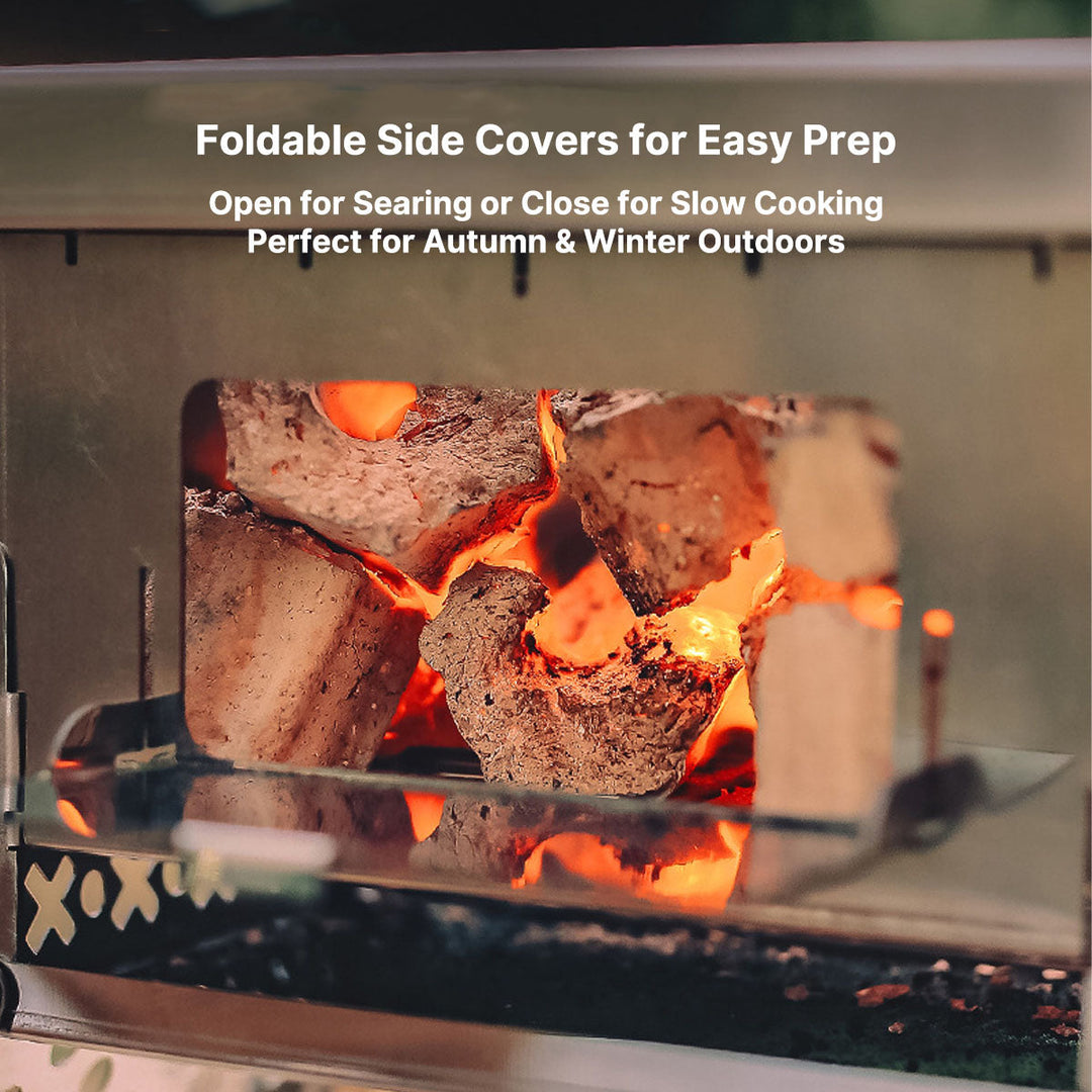 Portable wood stove with a burning fire inside, demonstrating its use for warm outdoor cooking sessions.
