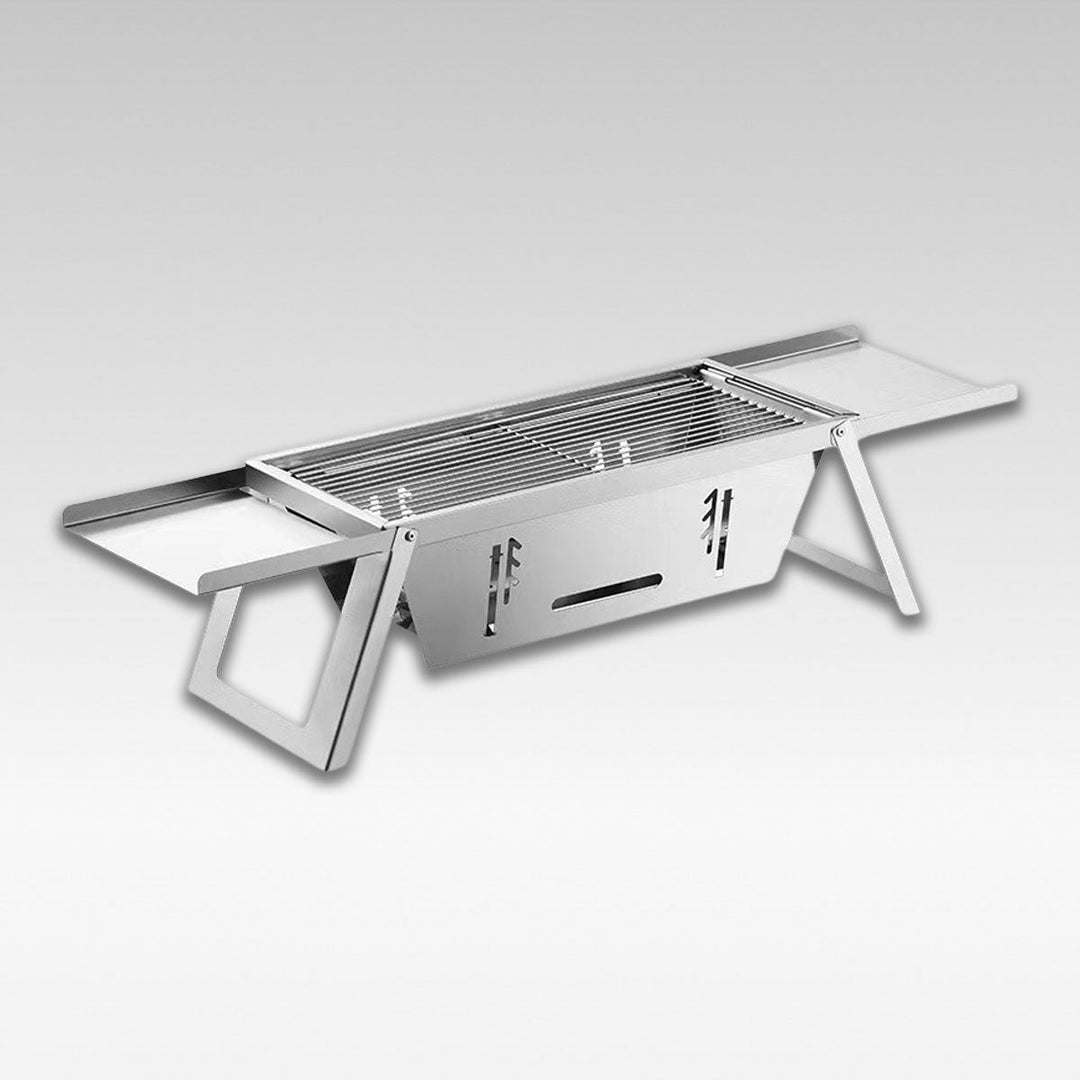 Portable charcoal BBQ grill, ultra-thin foldable design for outdoor camping and picnics.