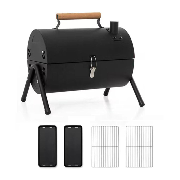 Portable charcoal grill for camping and outdoor use, highlighting its practical design.