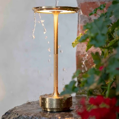 Stylish portable table lamp, cordless, with adjustable LED light; ideal for desks & home decor.
