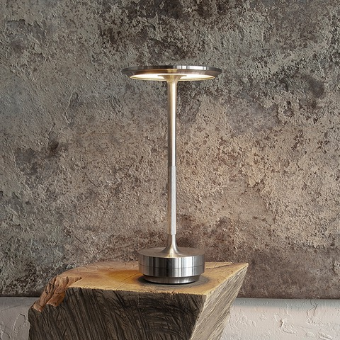 Versatile cordless LED lamp: rechargeable, adjustable brightness, perfect for reading or ambient light.