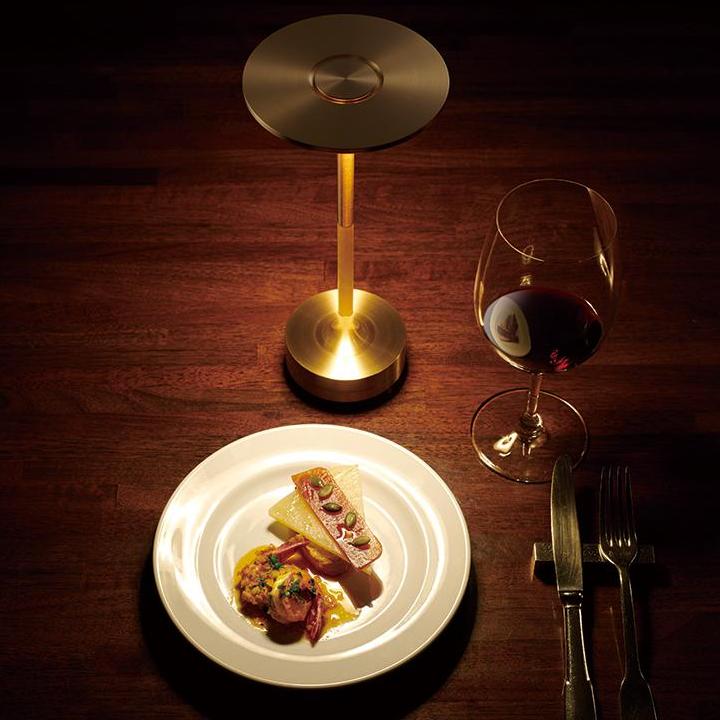 Modern cordless table lamp, adjustable light intensity for perfect ambiance.
