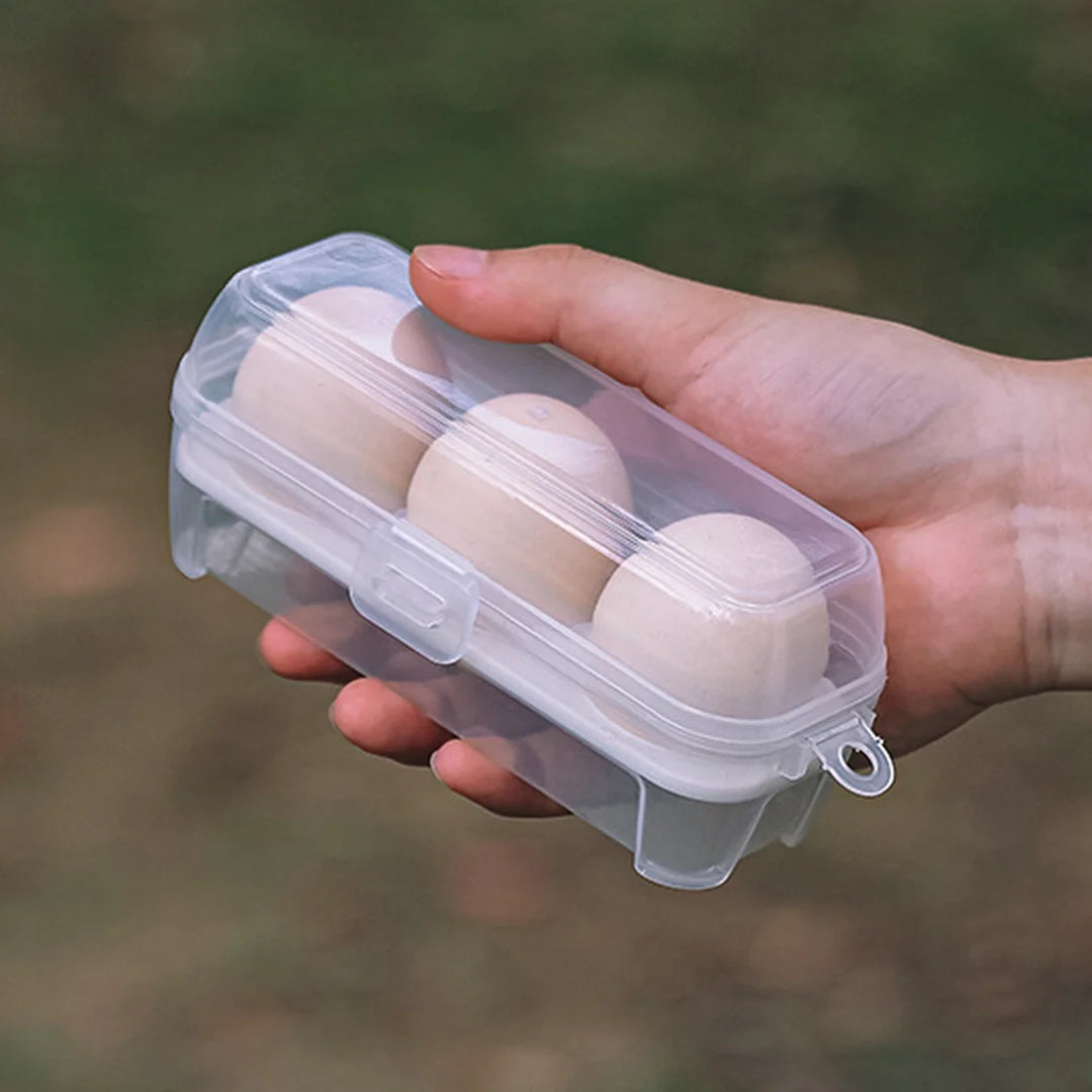 Clear portable egg holder, shows contents, 12-egg capacity, camping & hiking gear.