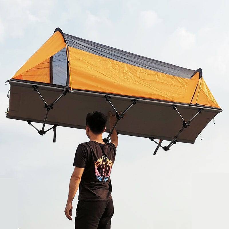 Camo portable elevated camping tent cot, sturdy sleeping gear for hiking and camping adventures.