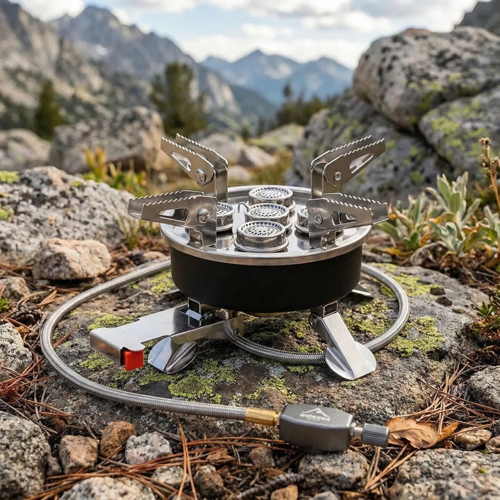 Portable gas camping stove, ideal for outdoor cooking & hiking. Compact design, easy to carry.