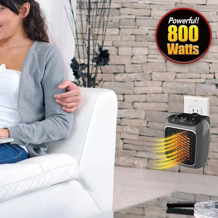 Compact grey electric space heater with remote, easily moved for targeted warmth.