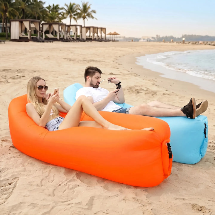 Portable inflatable air lounger for outdoors, easy setup camping, beach, garden relaxation.