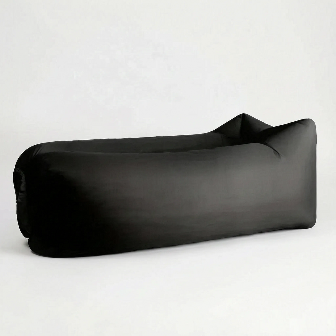 Durable inflatable camping gear: portable air lounger for hikers & travelers, no pump outdoor seating.
