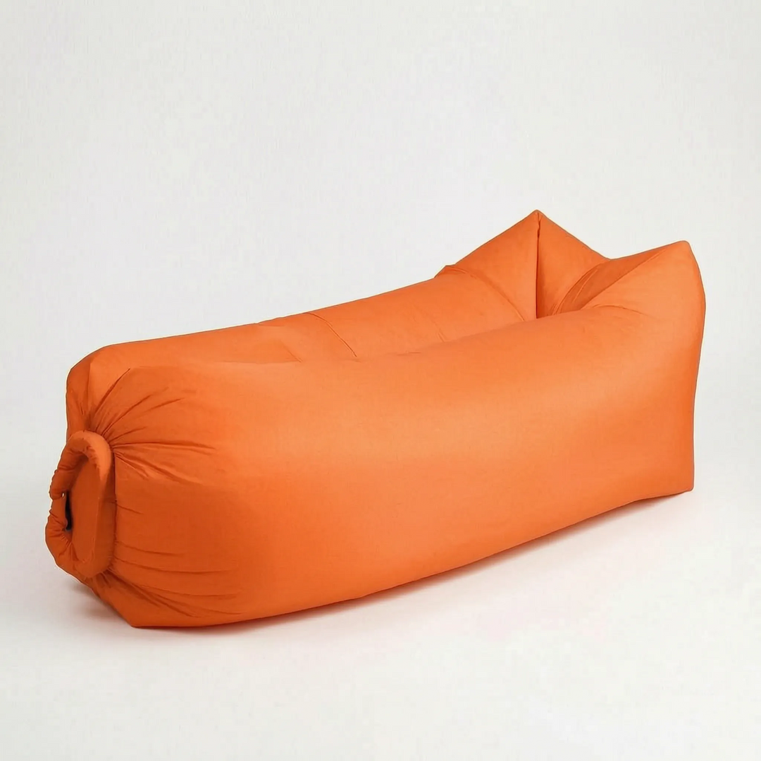 No-pump inflatable air lounger for quick outdoor setup. Portable travel comfort, perfect for beach & camping.