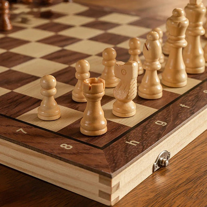 Compact wooden magnetic chess set with pieces, ideal for travelers seeking a durable and portable board game.