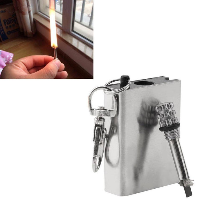 Close-up of silver Portable Metal Flint Match, a compact and essential survival tool for outdoor adventures.