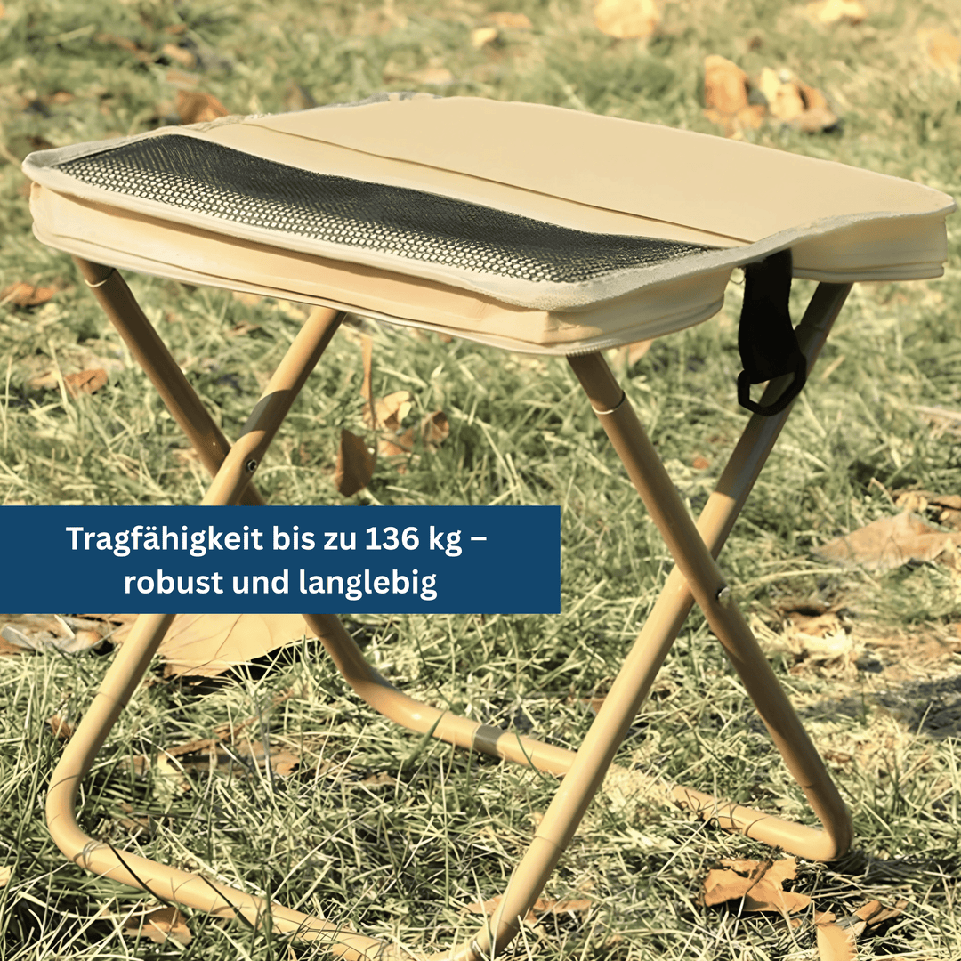 Foldable lightweight camping chair with drink holder and carry bag.