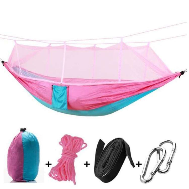 Durable double hammock with insect protection netting, designed for outdoor use.