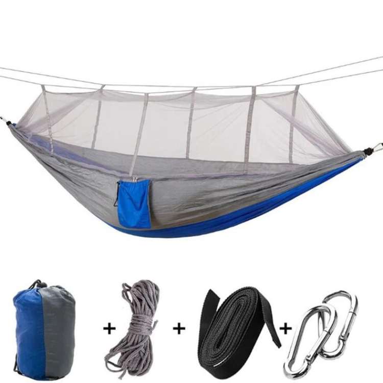 Relaxing outdoor portable hammock with mosquito net, suitable for all campers.