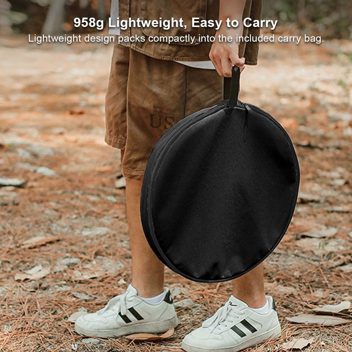 Round outdoor table with built-in mesh pocket, easily foldable for camping trips