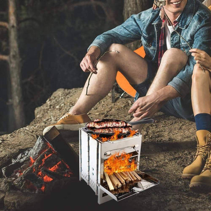 Portable stainless steel folding camping stove, ideal for outdoor cooking, backpacking, and hiking.