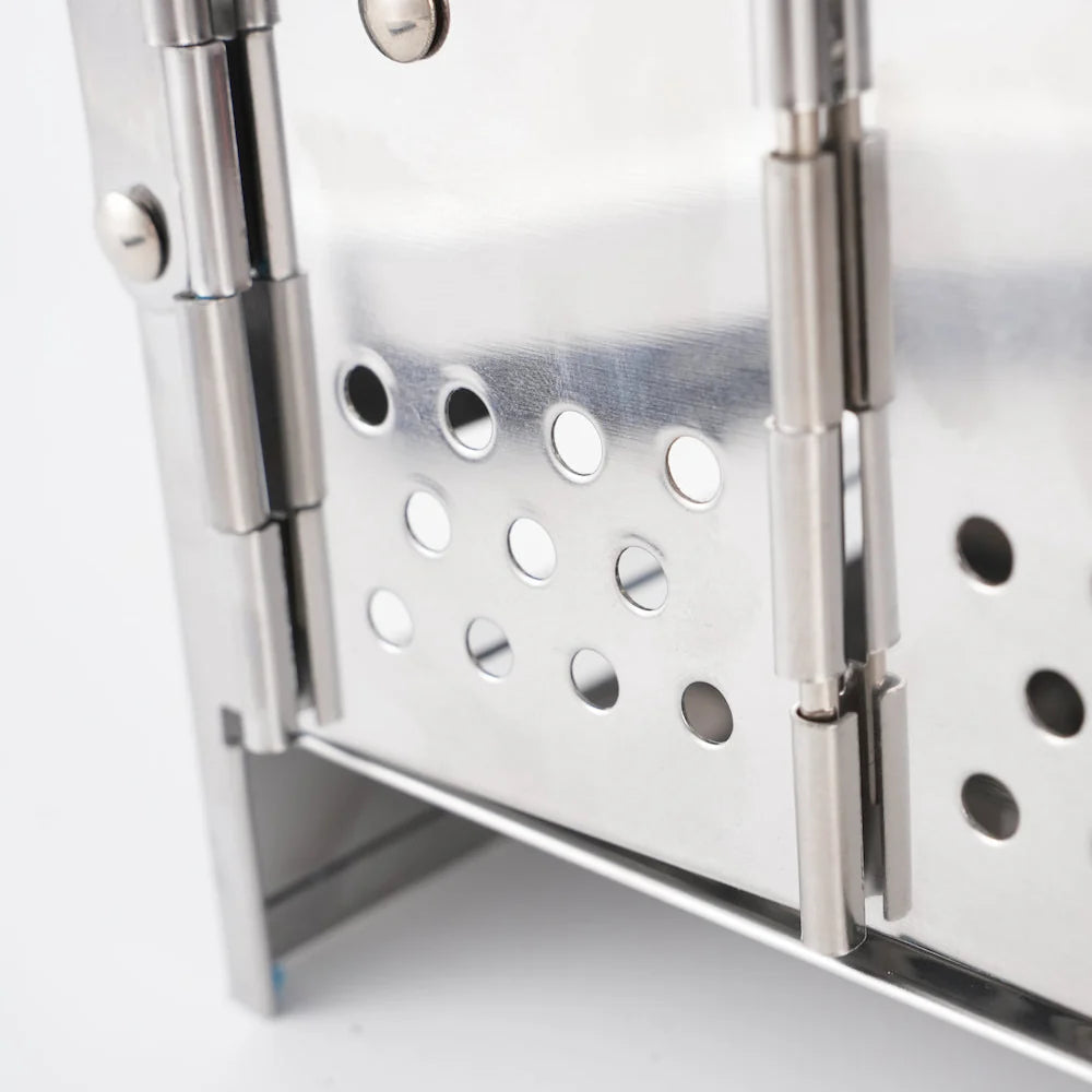 Compact stainless steel wood burning stove for camping, great for survival and emergency use