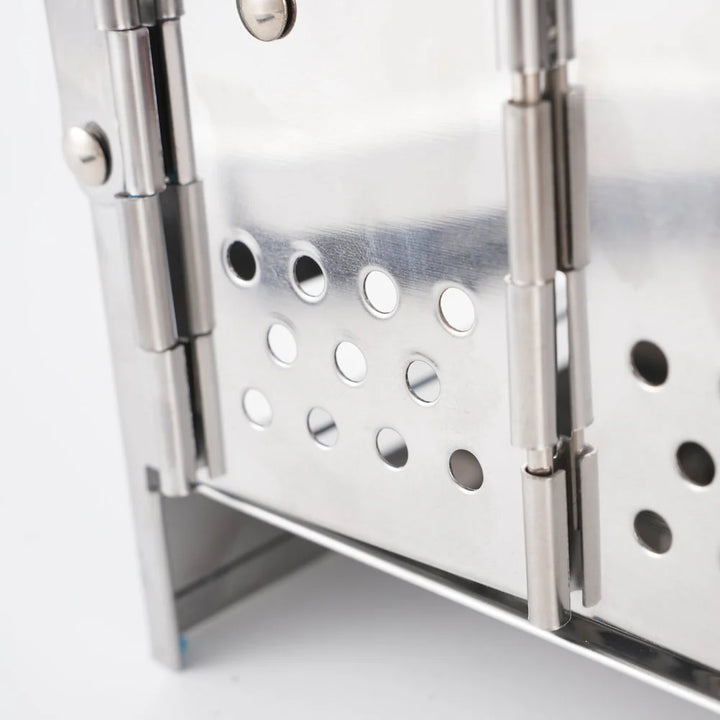 Compact stainless steel wood burning stove for camping, great for survival and emergency use