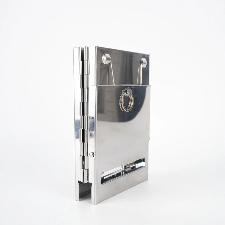 Ultra-portable stainless steel camping stove, designed for wood burning and multi-fuel use outdoors