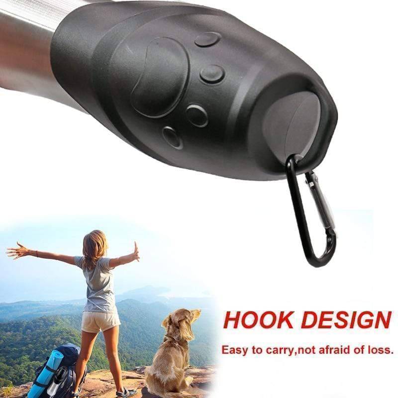 Close-up of a portable stainless steel pet bottle, essential outdoor gear for dogs.