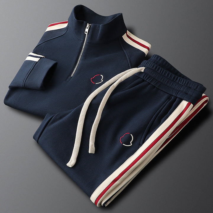 Premium men's quarter-zip tracksuit set. Ideal for athletic activities, casual wear & comfort.