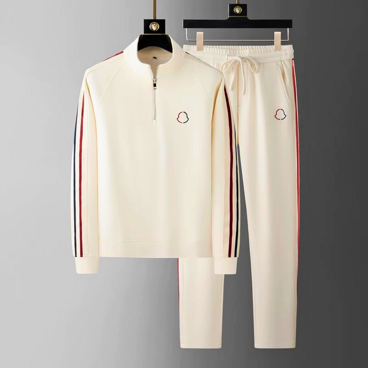 Folded premium men's quarter-zip tracksuit set, neatly packed for travel or storage.