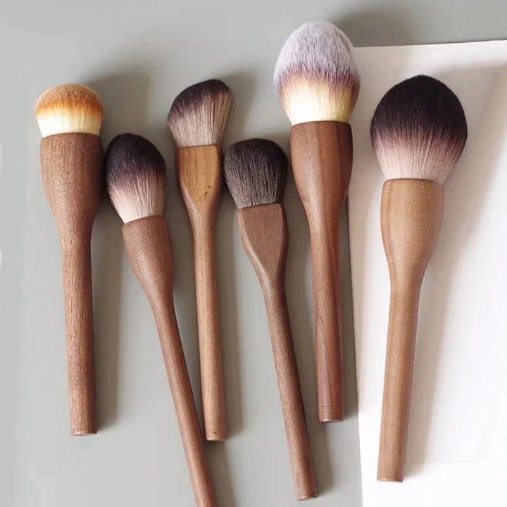 Soft synthetic bristles & ergonomic walnut handles in this professional vegan makeup brush collection.